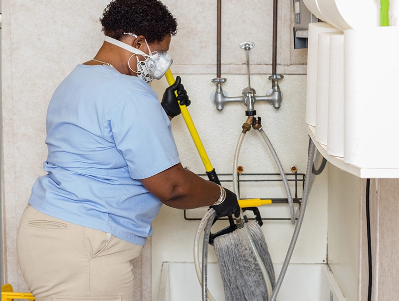 Lady mopping floor