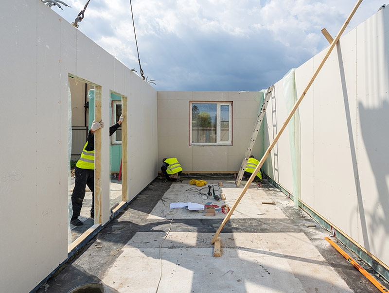 people building modular structure