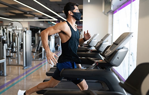 Man exercising on treadmill